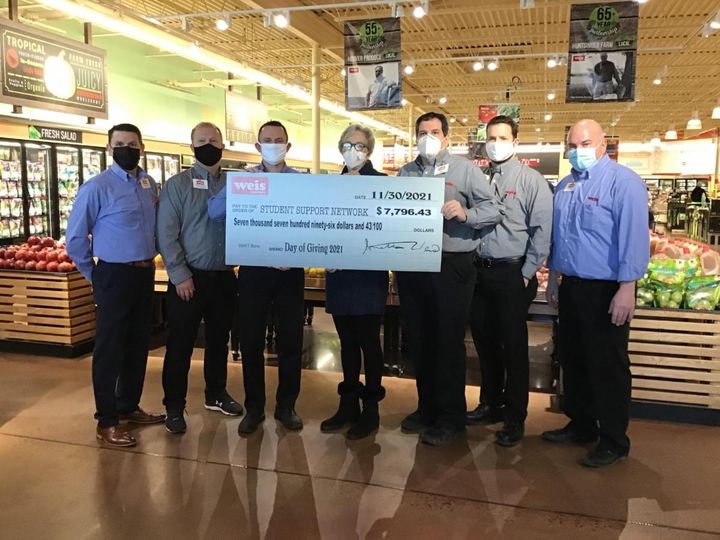 Baltimore County Weis Markets Presented The Network With A Check