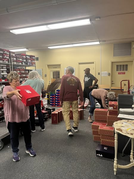 Hub volunteers shoe sorting 05072025