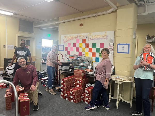 Hub volunteers shoe sorting2 05072025
