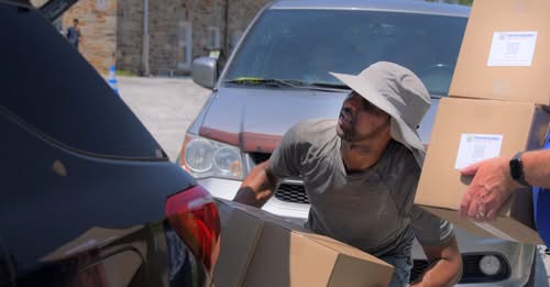 baltimore sun photo drive thru summer food program 07002025